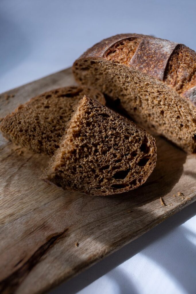 A Wholemeal Bread on a Chopping Board